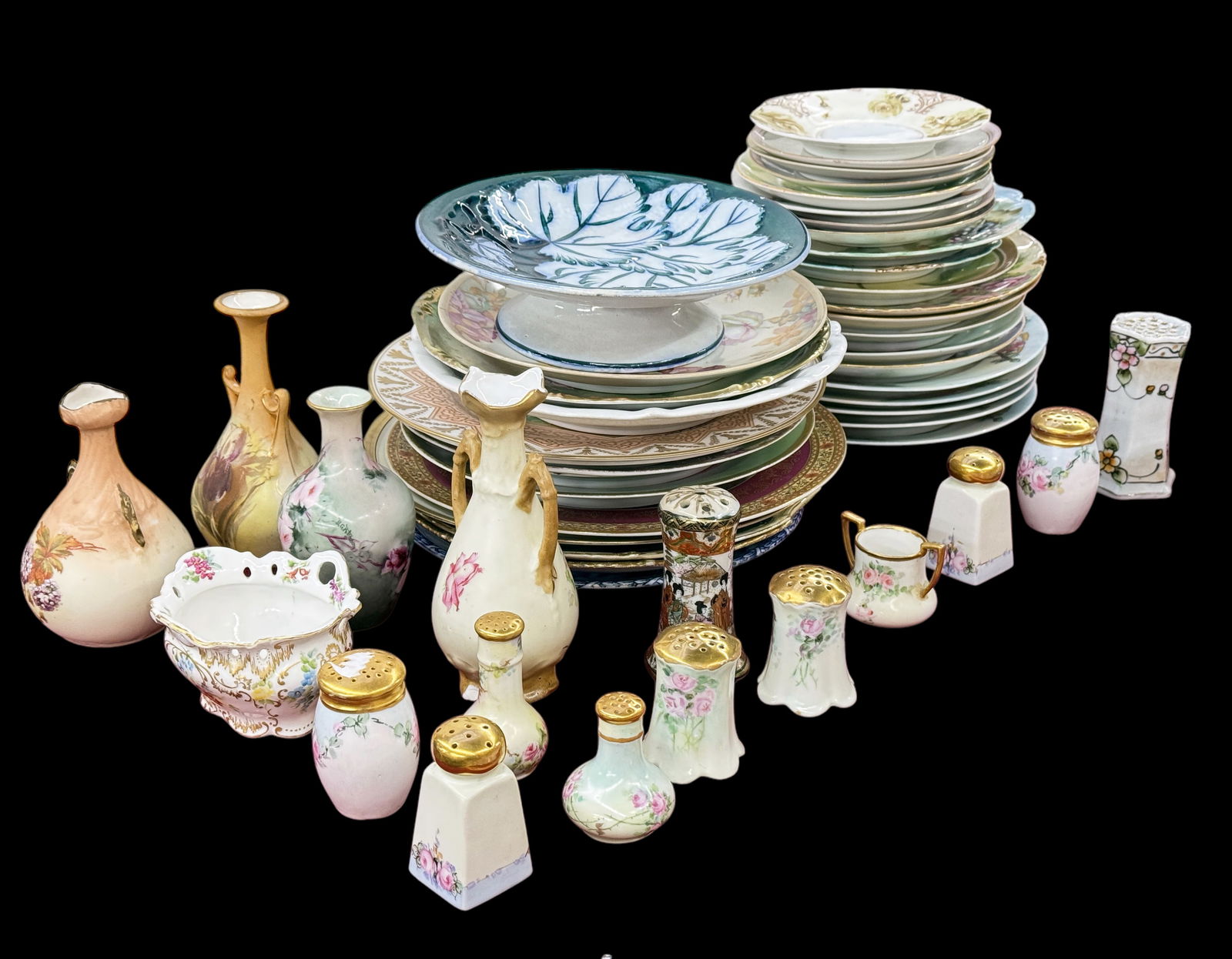 Lot of Assorted China - Nippon, Limoges, Bavarian.: This lot includes plates, vases, and salt & pepper shakers. The plates come from France, England, Germany, Austria, Czechoslovakia, and other countries. Most of the salt shakers are from Japan. Overal