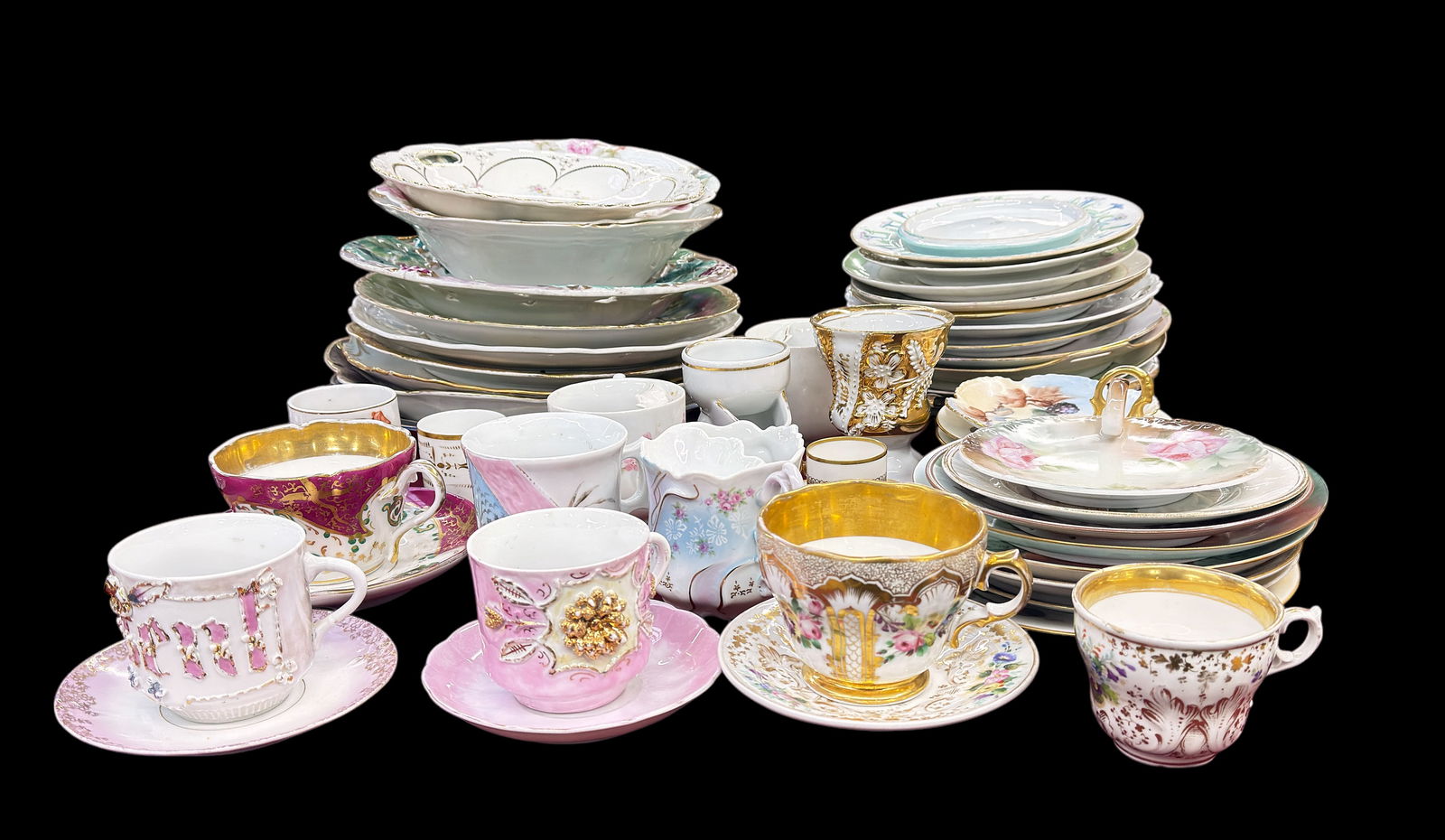 Lot of Antique Plates & Mugs- Limoges, Nippon, etc: This lot includes a number of hand painted plates and cups, in overall good condition. The lot includes Nippon, Limoges, Hutschenreuther, Thomas Bavaria, and more. The largest item measures 12 1/4" ac