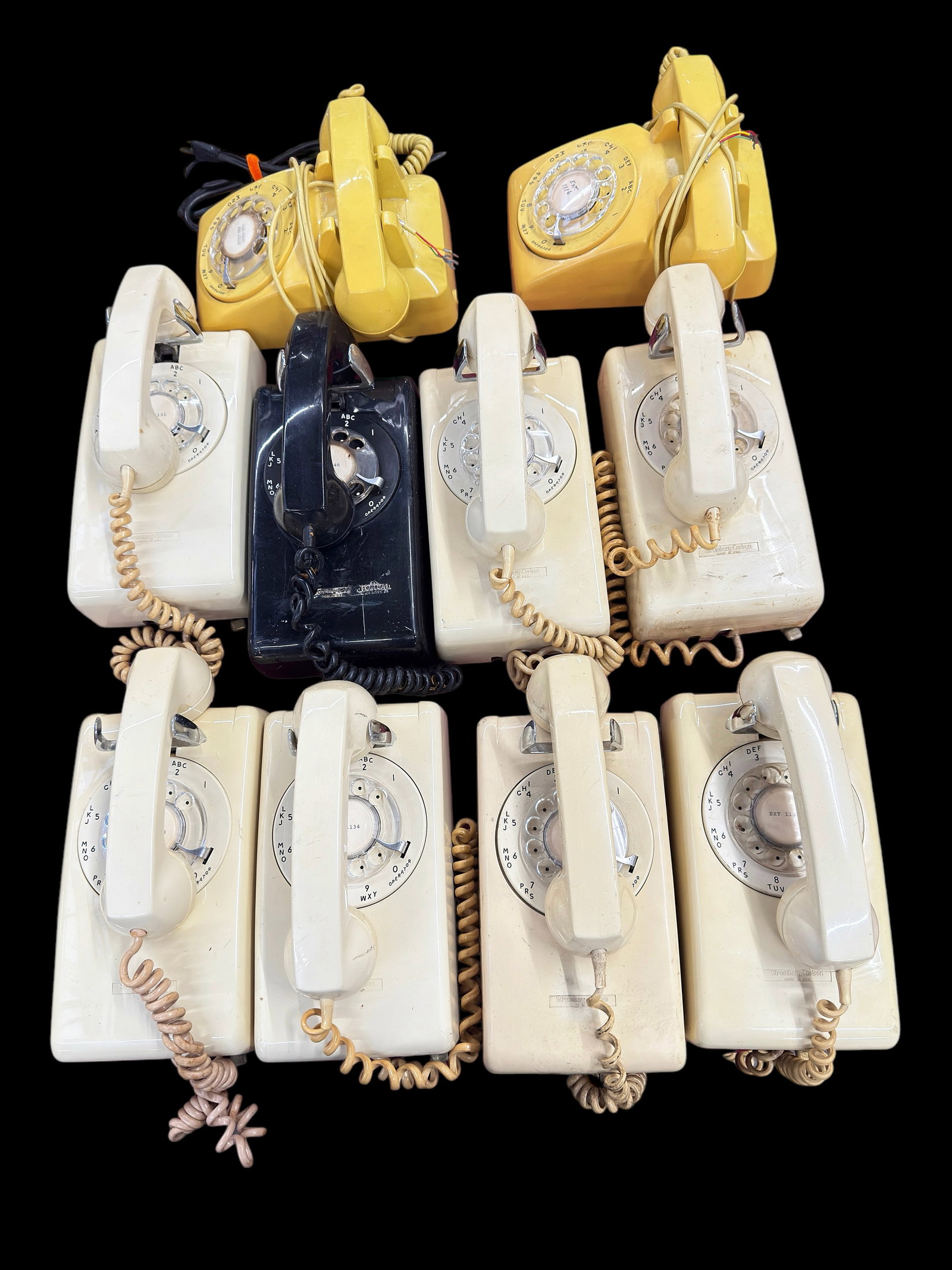 Lot of 10 Vintage Stromberg Carlson Telephones.: The two yellow telephones would be on a side table; the other eight go on the wall. Cosmetically, they look to be in overall good condition, with some signs of surface wear. In-house shipping is avail