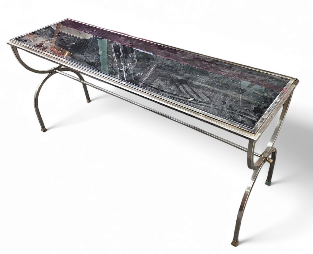 Long Mirrored Modern Metal Table.: The top is dark tinted glass. The table is in good overall condition. It measures 27 tall, 60" wide, and 18" deep. Third-party freight shipping or personal pickup is required. Please see our website f