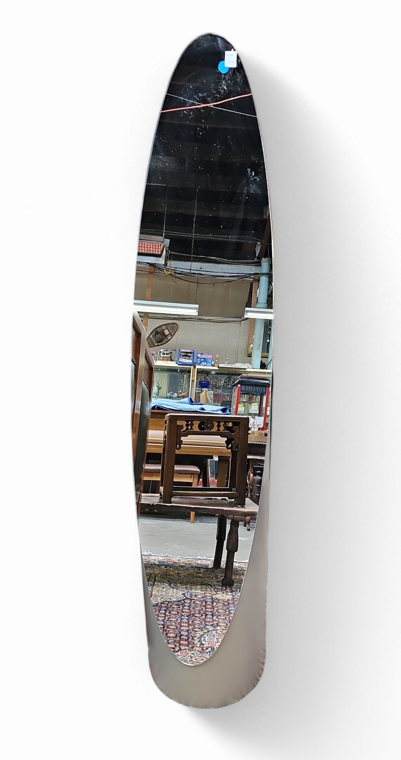 Gaia "Lipstick" Modern Mirror.: This contemporary floor mirror is manufactured by Gaia Home. It is a slender designed floor mirror. It is in good overall condition, with some minor scratches. It measures 57 1/2" tall, 12" wide, and 