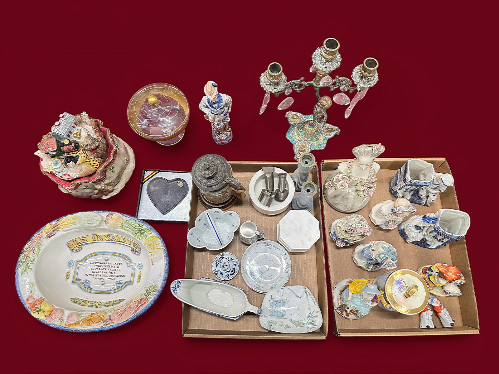 Lot of Various Antiques - Brass, Porcelain, Japan.: The lot includes over 30 items. There are porcelain figurines, hand painted flow blue items, a Hauber & Reuther beer stein, a colorfully painted brass cherub 3-arm candelabra, a few ceramic items, gra