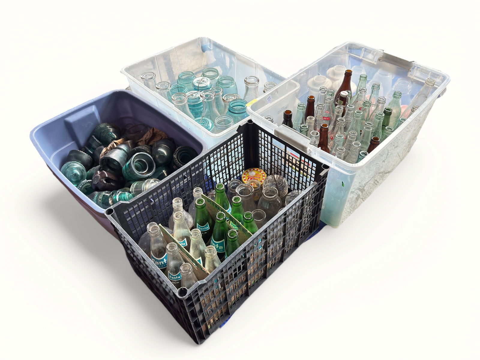 Lot of Vintage Glass Bottles & Jars - Ball, Milk.: The lot contains old glass drink bottles, milk jugs, lidded blue glass Ball mason jars, and Hemingway Co. glass insulators. The brands observed are Nehi, Clicquot Club, Blatz,. Elgin National Brewing