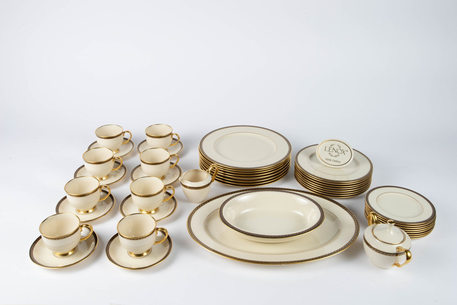 Lenox "Tyler" China Set - Service For 8.: This is the John Tyler Presidential set, with a black and gold border. The set includes the following: 8 dinner plates, 8 salad plates, 8 bread and butter plates, 8 teacups, 8 saucers, a creamer, a su