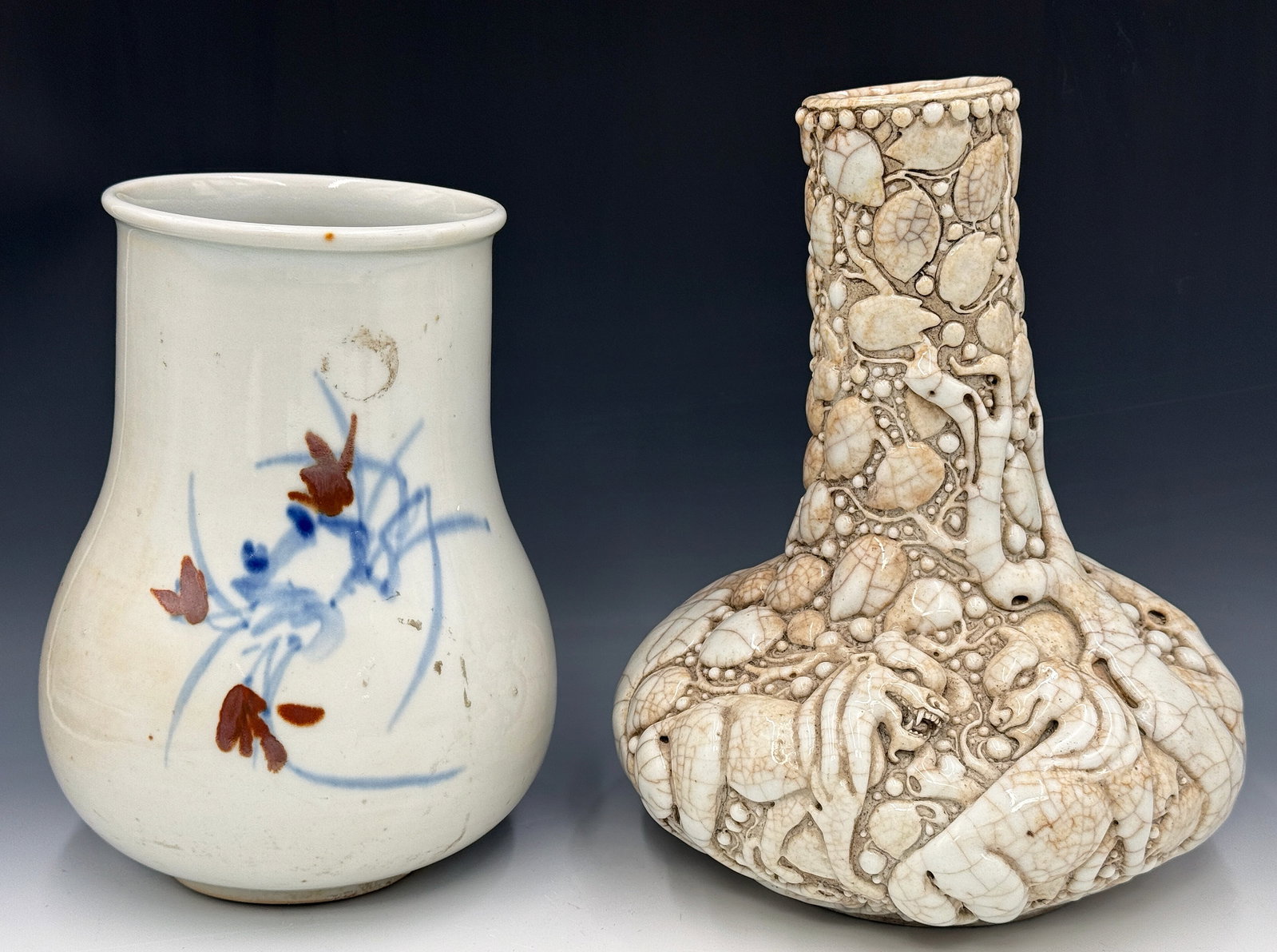 Lot of 2 Old Japanese Porcelain Vases.: The lot consists of an unusual Satsuma vase with detailed, raised relief work featuring dragons and foliage. It measures 10 3/4" tall, with an 8 1/2" diameter base. It is in good overall condition. Al