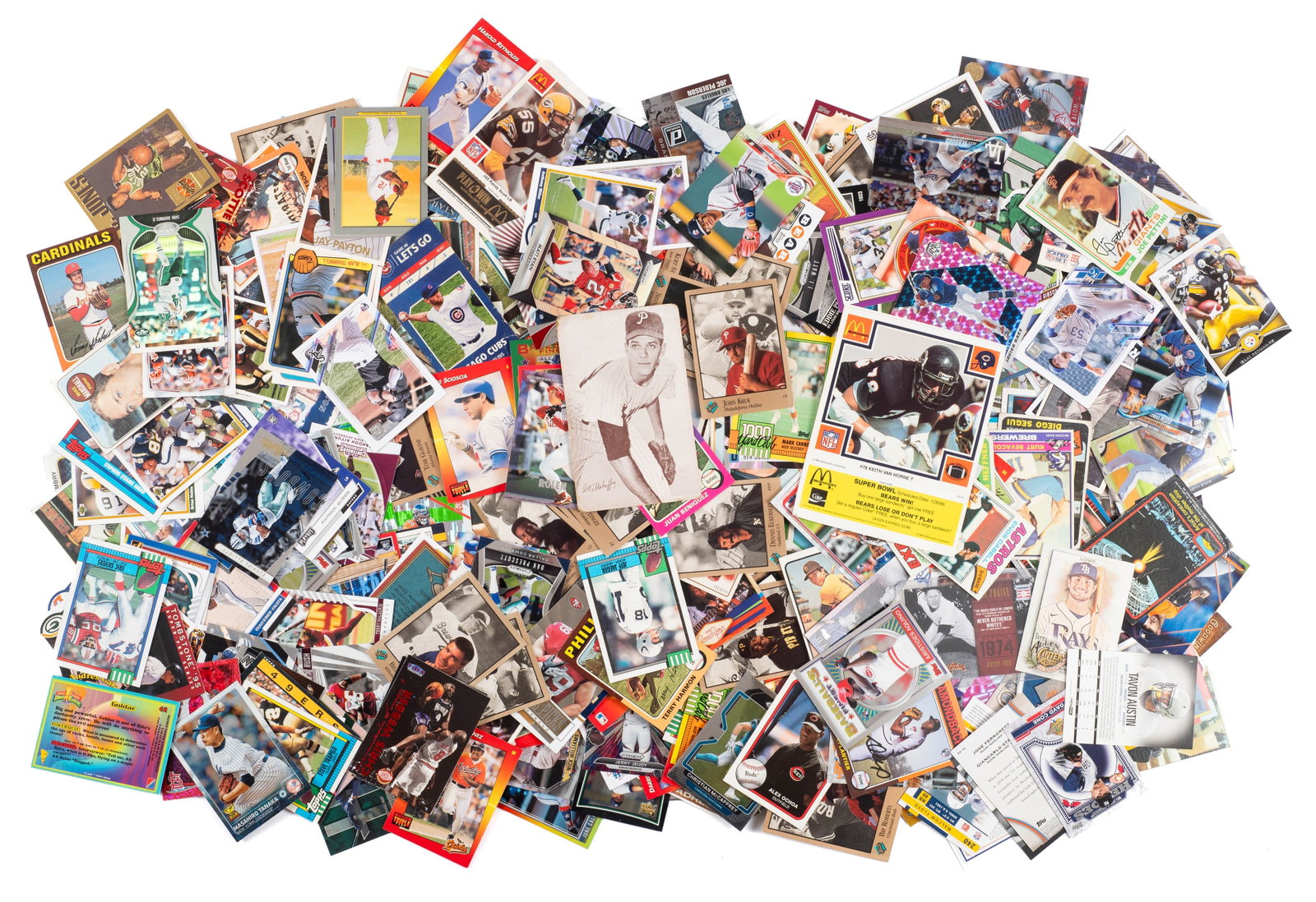 Lot of Mostly Baseball & Football Trading Cards.: The lot includes cards from different eras. Some of the MLB athletes featured are Sammy Sosa, Mo Vaughn, Roger Clemens, Tom Glavine, Ken Griffey, jr., Mookie Betts, and more. Some of the NFL athletes 