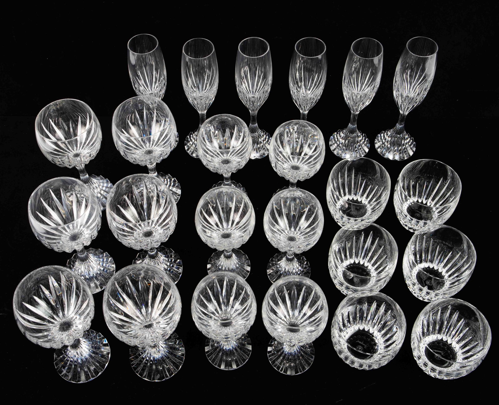 24 Pcs. Baccarat Massena Crystal Drinkware Variety: The lot contains 4 types of drinkware from the Baccarat Massena collection. There are 6 Champagne flutes, 6 red wine glasses, 6 white wine glasses, and 6 tumblers. The smallest glass measures 4" tall 