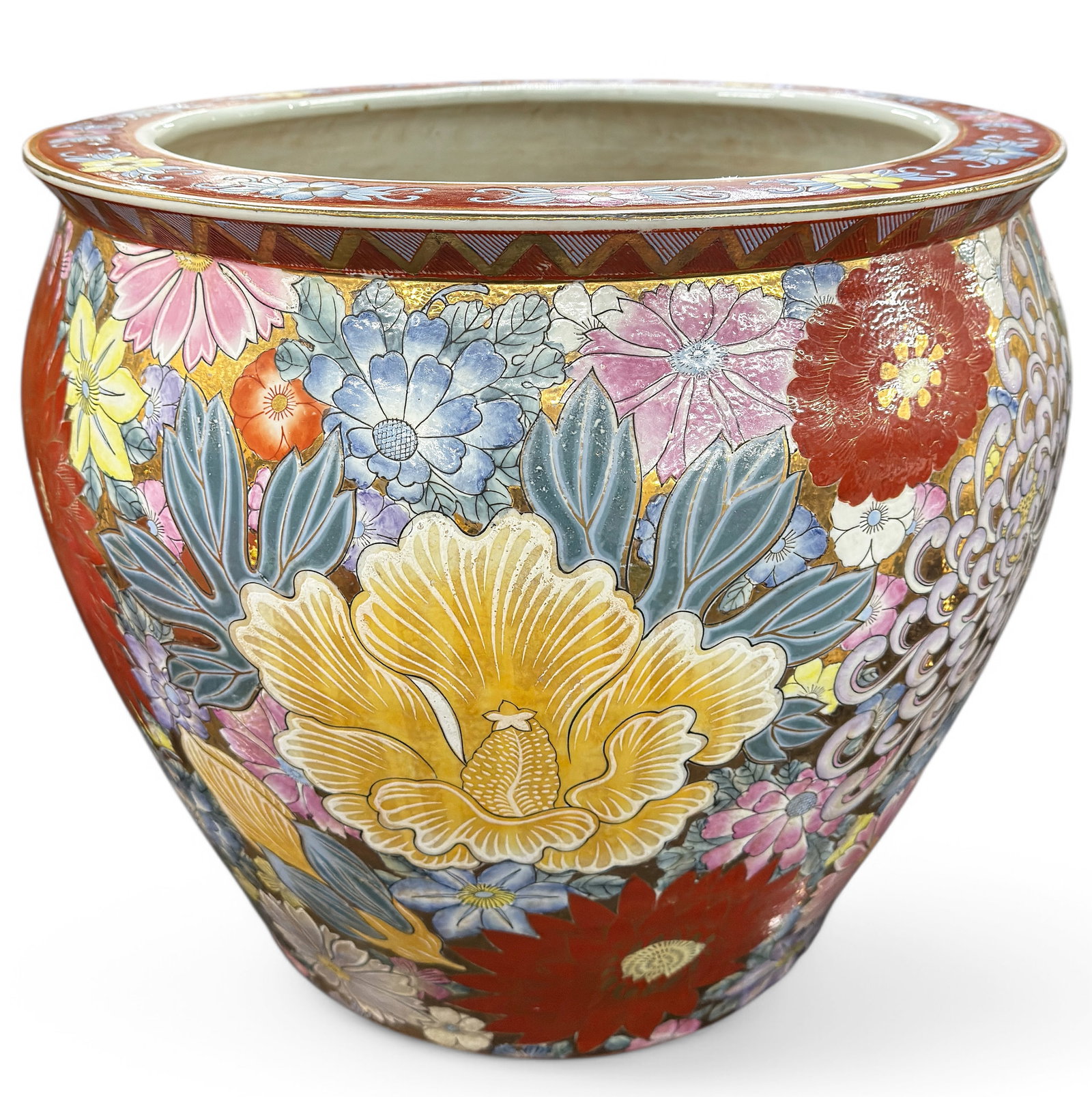 Large Chinese Porcelain Jardiniere or Planter.: The jardiniere is in good overall condition, but has some discolored specks (possible flaking) in the paint. It has a mark on its underside. It measures 16" tall, with a 19" diameter. Third-party ship
