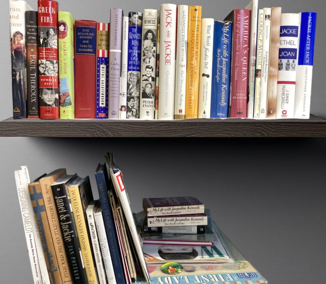 Lot: Mostly Jacqueline Kennedy Books, Memorabilia.: Most of the books and other publications in this lot relate to former First Lady Jackie Kennedy Onassis. There are some items that relate to the Kennedy family in general, and one book relating to the