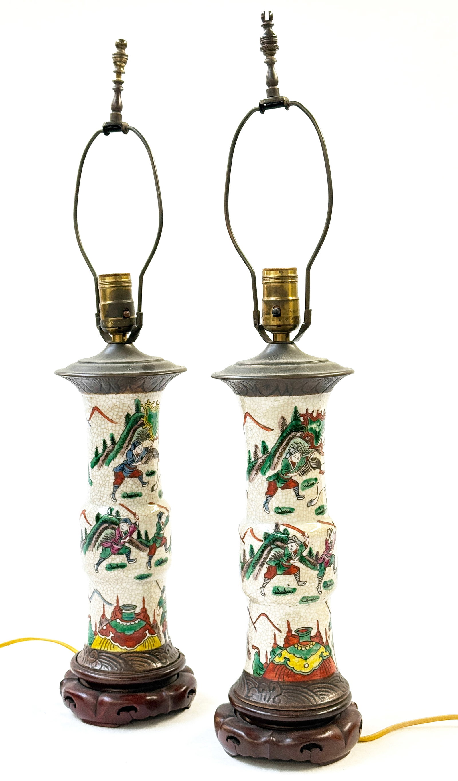Pair of Late Qing Dynasty Chinese Porcelain Lamps.: The lamps are in good overall condition. Each measures 25 3/8" tall and 5" in diameter. The porcelain centers measure 11 1/4" long. In-house shipping is available. Please see our website regarding in-