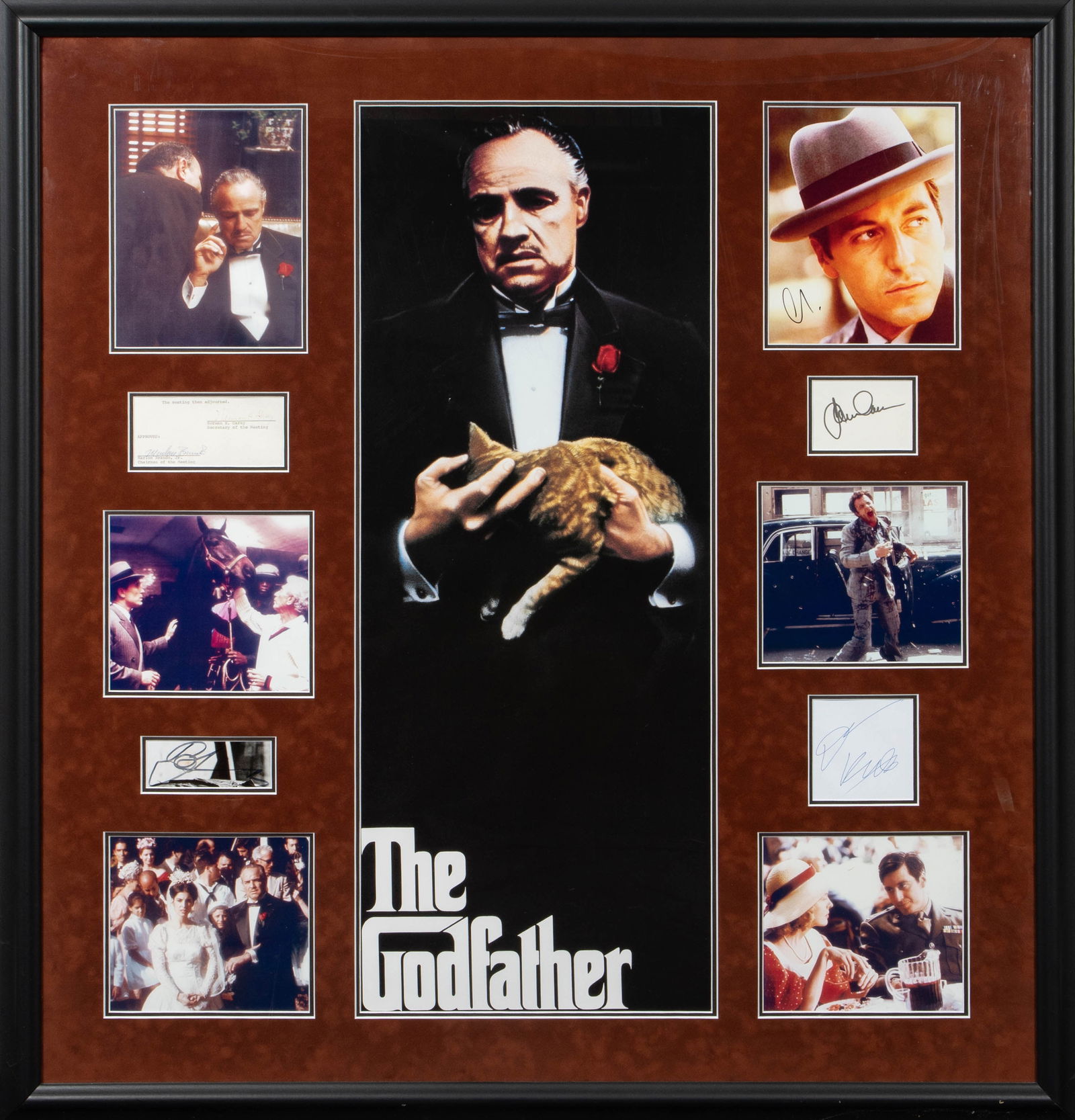 The Godfather Autograph Display - Pacino, Brando.: This Godfather display includes several movie stills and some autographs. The signatures included are Marlon Brando, Jr., Al Pacino, James Caan, Diane Keaton, and Robert Duvall. The frame measures 45"