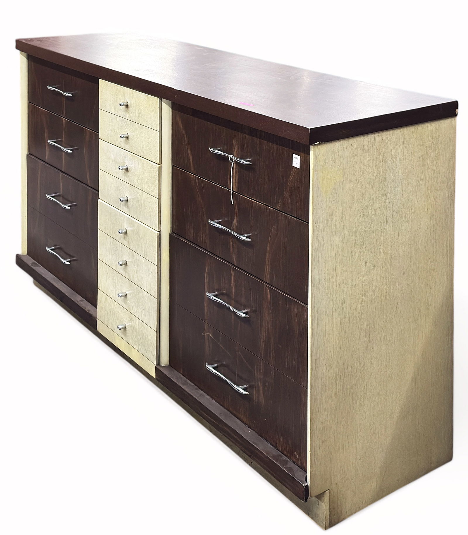 Mid Century Modern 9-Drawer Two Tone Credenza.: The credenza or dresser features three columns of drawers, each with three drawers, including the bottom double drawers. It measures 33" x 58" x 18". It has some scuffs and stains. Otherwise, it is in