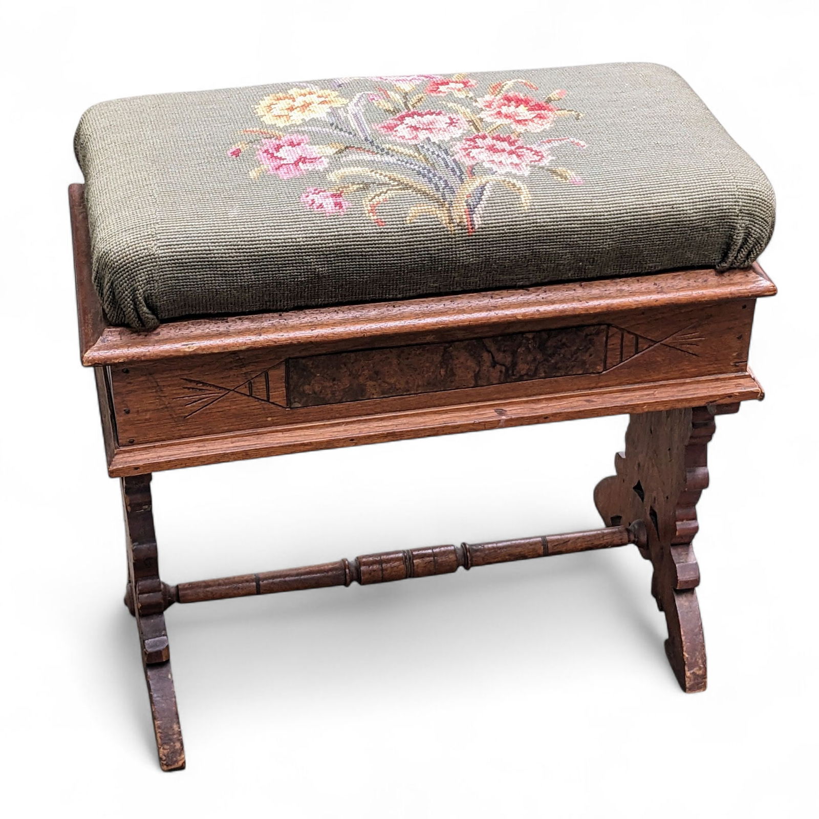 Antique Victorian Organ Stool.: This walnut stool or bench comes has a needlepoint lift top seat. There are some scratches, and some of the trim is not attached properly. It measures 21" wide, 10 1/2" deep, and 20 1/2" tall. Third-p