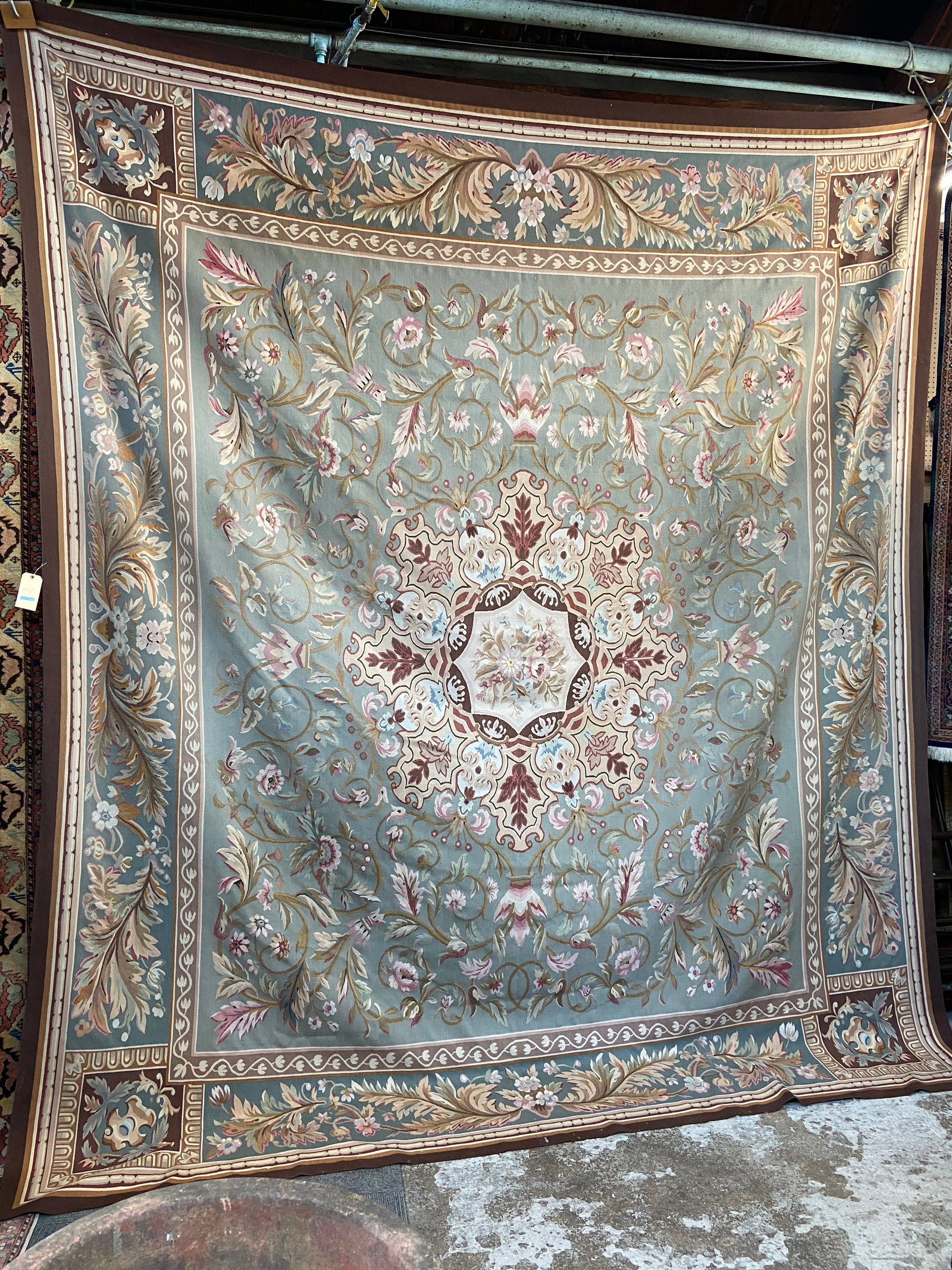 11' 6" x 13' Ornate Aubusson Rug.: The rug has a few tiny spots on it, but is in overall fantastic condition. In-house shipping is available for this rug. Please see our website about in house shipping procedures.