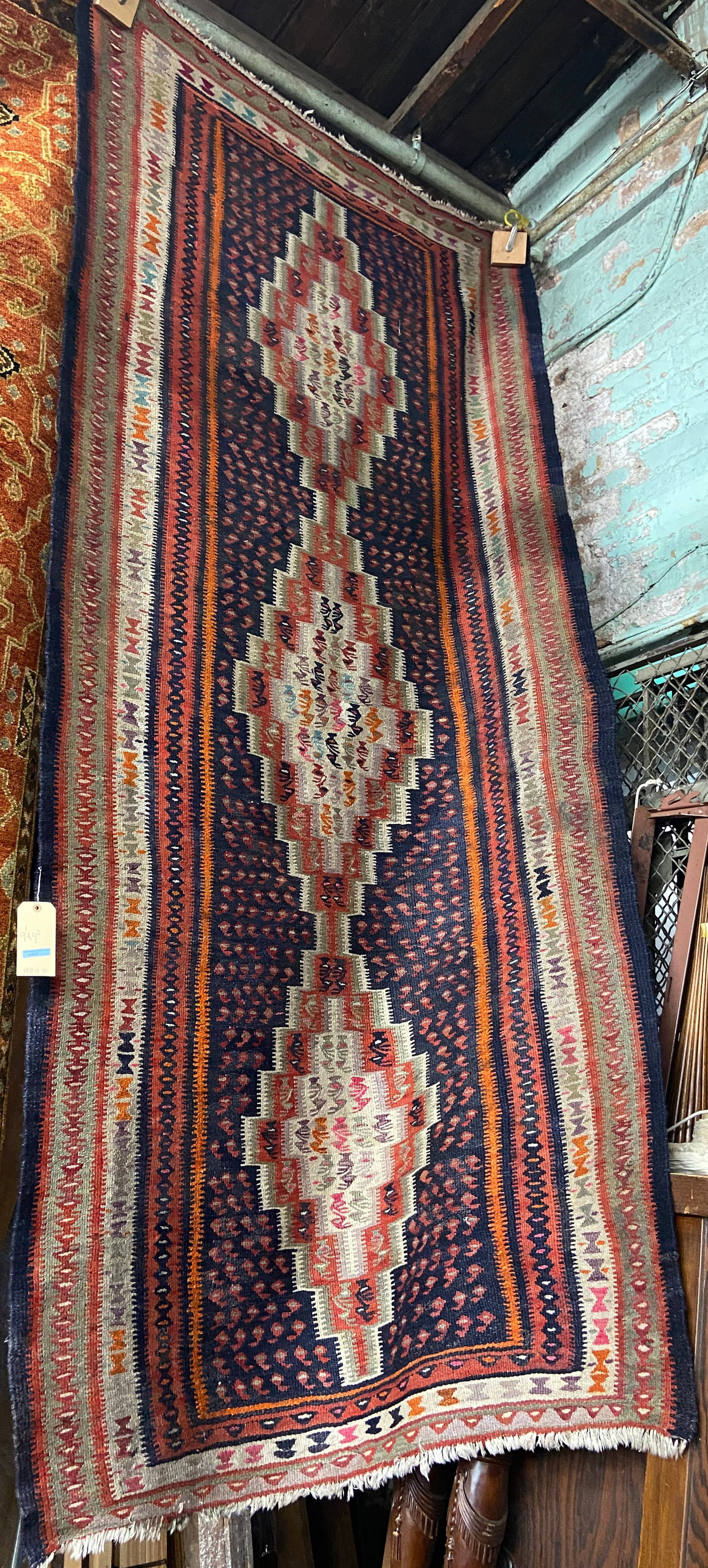 4' 3" x 9' 1" Kelim Runner / Rug.: The rug looks to be in good overall condition. In-house shipping is available for this rug. Please see our website about in house shipping procedures.