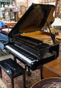 Wurlitzer Polished Ebony Baby Grand Player Piano.