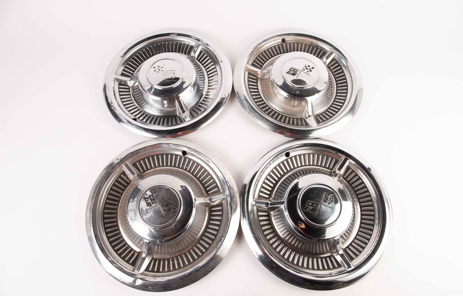 Set of 4 Chevy Corvette Hubcaps. (1 of 5)