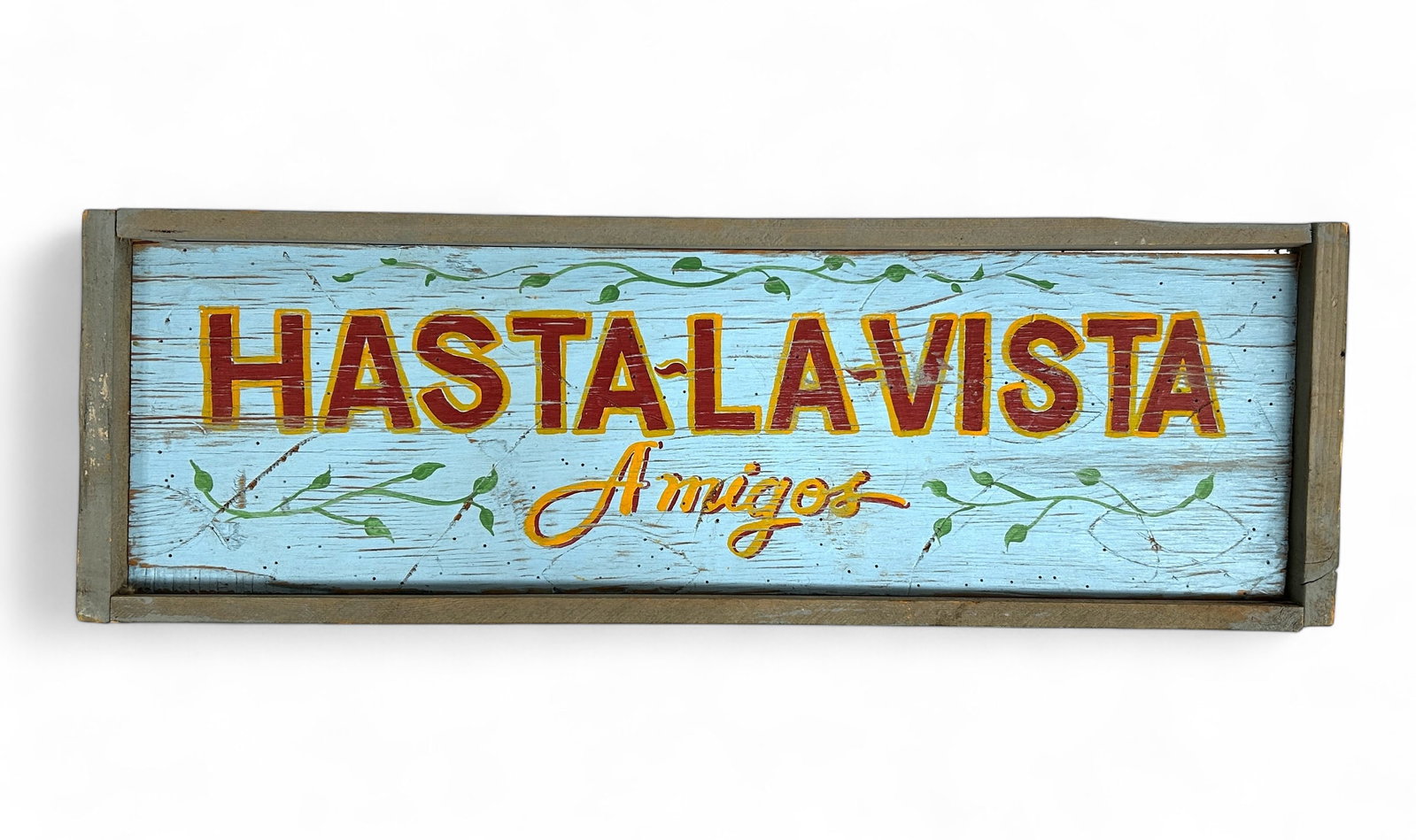 "Hasta La Vista Amigos" Folk Art Wood Sign.: The artist is David F. Young; the signature is on the back. The sign looks to be in overall good condition, with some scratches and signs of surface wear. It measures 32 1/4" x 10 1/2" x 1 5/8". In-ho