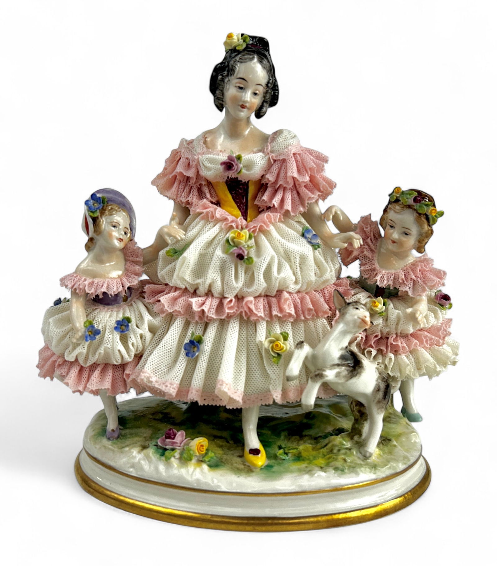 Volkstedt Dresden Lace Mother Daughter Figure.: The underside of this figural group has an Aelteste Volkstedt mark. The scene depicts a mother with her two small daughters, and a little lamb prancing in front of them. Overall, it looks to be in nic