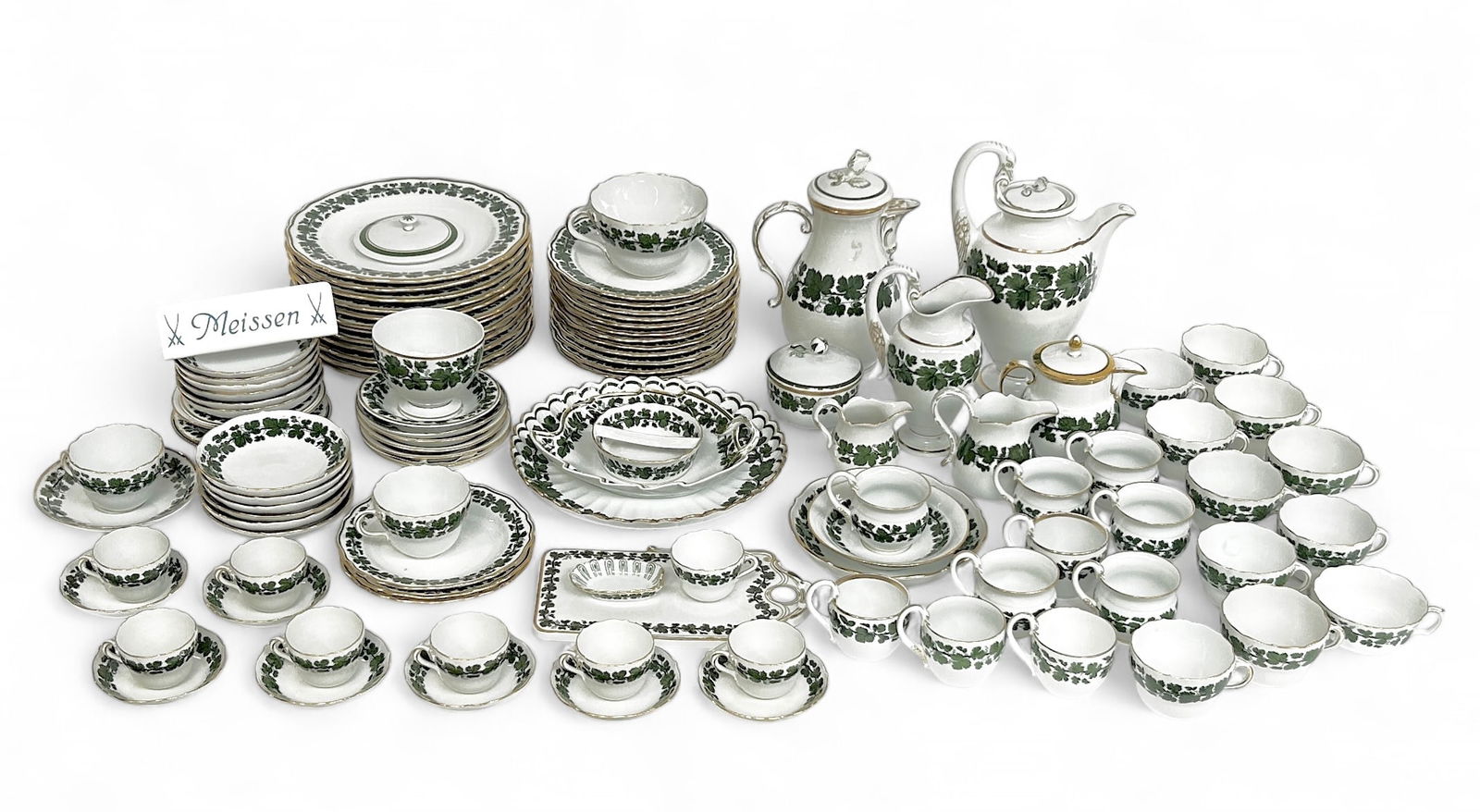 150 Pcs. Meissen Green Ivy Service for 12 & More.: The lot contains 150 pieces. There are 12 dinner plates, 12 salad plates, 12 tea cups, 10 hot chocolate cups, and 8 espresso cups. The lot also includes 12 fruit bowls, a coffee pot, a tea pot, 4 smal