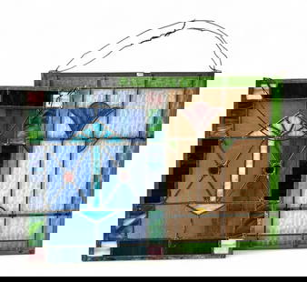 Two Leaded Stained Glass Windows.: The windows have floral and jewelled designs. The large piece measures 22" x 20 1/2", and the smaller one measures 21" x 16 1/2". The frame is a bit loose on the smaller window. Otherwise, the lot is