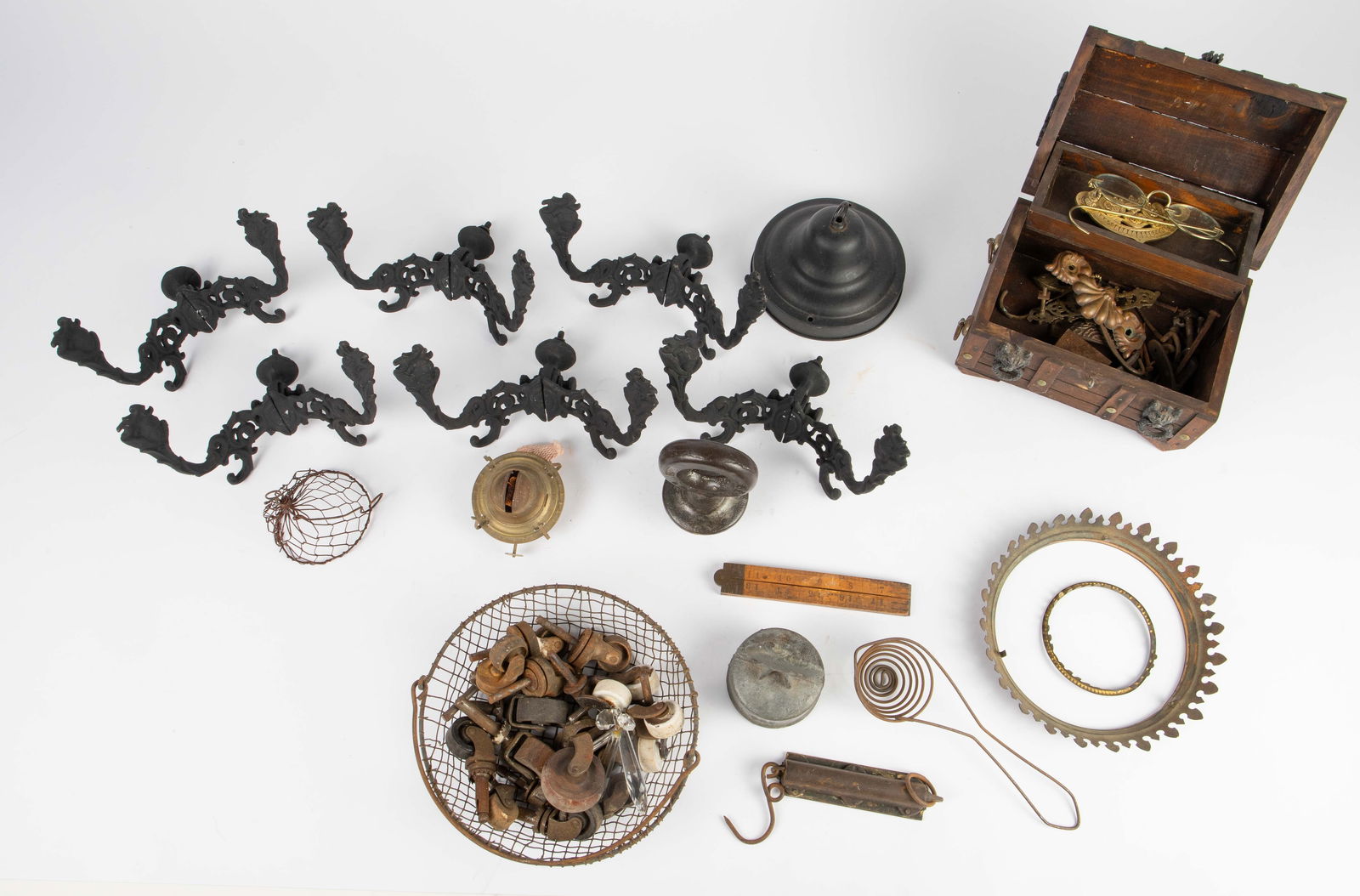 Lot: Antique Cast Iron Wall Hooks, Casters & More. (1 of 7)