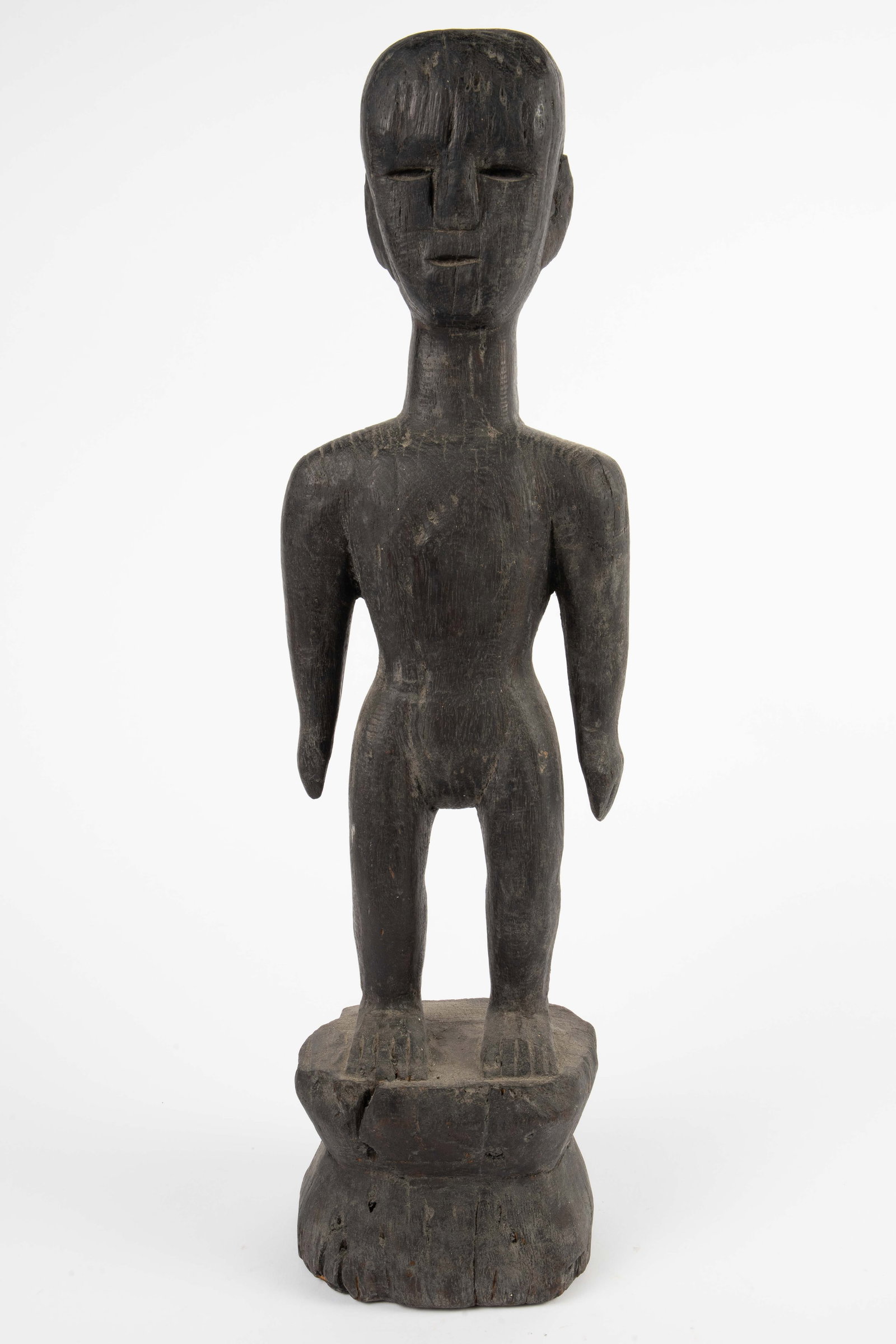 Carved Wood Bulul Standing Rice Deity Sculpture.: It may be an Ilfugao carving from the Philippines. Aside from some dust in the crevices, it looks to be in good condition. It measures 23 1/2" tall, 6 3/4" wide, and 5" deep. In-house shipping is avai