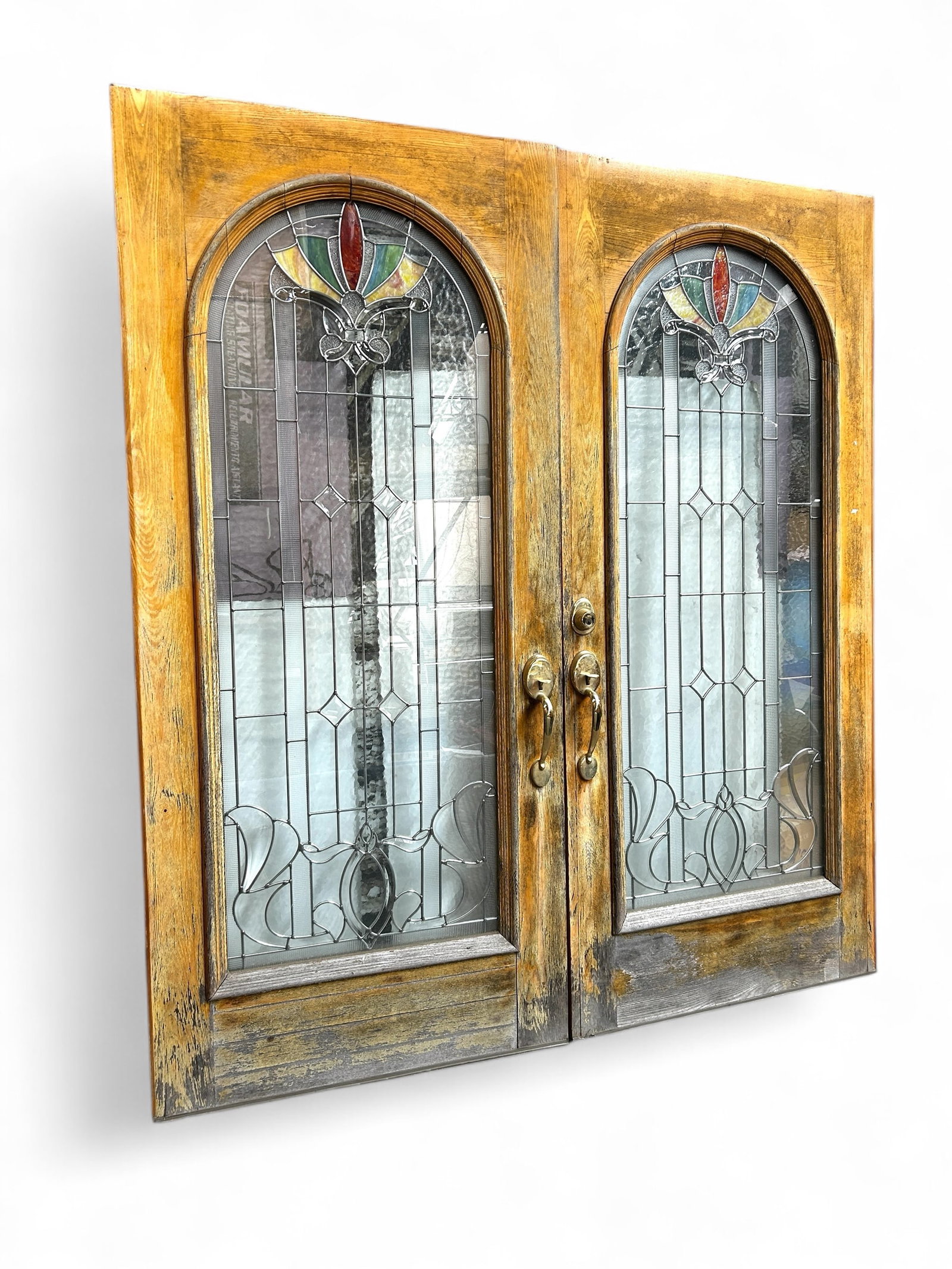 Pair of Contemporary Leaded Glass Entrance Doors.: The doors have some wear to the finish of the wood, otherwise, they look to be in good overall condition. The leading and glass look good - the top portion of the glass is both bevelled and stained. T