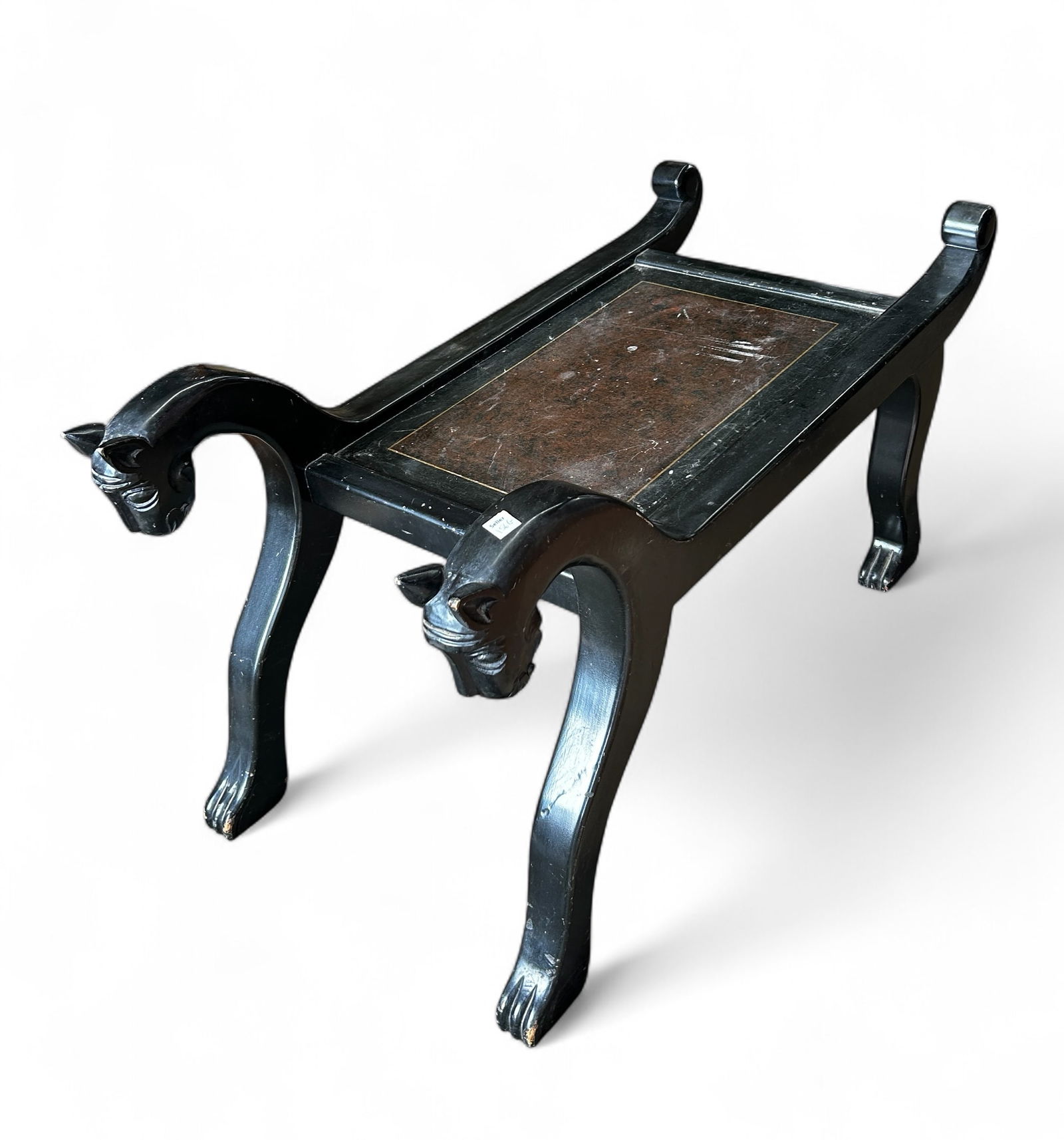 Ebonized Stand or Table with Horse Heads.: The table has a tray style top and carved feet. There are some scratches and scuff marks. It measures 42" long, 21" wide, and 22 1/2" tall. Third-party freight shipping or personal pickup is required.