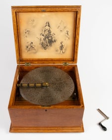 Antique Regina Tabletop Music Box in Oak Case.