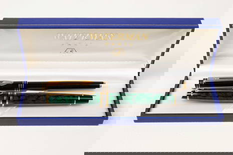 2 Waterman France Fountain Pens inc. 18K Gold Nib.: The lot contains 2 vintage Waterman pens, both made in France. There is black and gold Waterman Ideal fountain pen with an 18K gold nib, and a green tortoise shell design piece with gold and black det