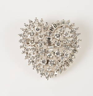 14K White Gold & Diamond Heart Pendant / Brooch.: This heart-shaped piece is marked 14K / 585 on the back. It features baguette and round cut diamonds. The largest diamonds measure 3mm in diameter. It measures 1 1/4" x 1 1/4", and weighs 7 Pennyweigh