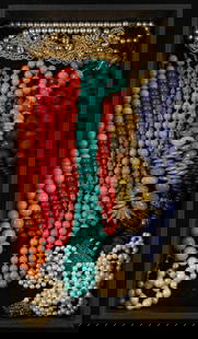Lot of Gemstone Jewelry - Coral, Turquoise, 925.: The lot contains 12 necklaces. They feature orange jasper, turquoise, red coral, blue glass dogon beads, and faux pearls. The marks observed are Kramer of New York and Carolee. Some pieces have sterli