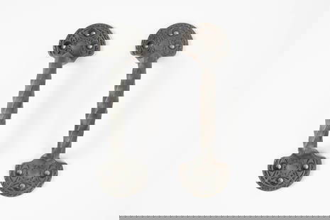 Louis Sullivan Chicago Stock Exchange Sash Pulls.: They are a matching pair of cast iron Chicago Stock Exchange window pulls designed by Louis Sullivan, and manufactured by the Yale & Towne Co. Each has a twist form handle with ornamental demilune