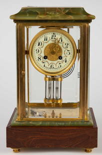 19th Cent. French Onyx and Rosewood Mantel Clock.: The clock is working. A key is included. The porcelain dial is hand painted, with flower garlands, filigree clock hands, and an embossed gilded central medallion. It reads, "Ryrie Bros Toronto", which