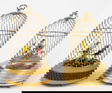 Lot of 2 German Automaton Birdcage Music Boxes.: They do not appear to be working. The small cage has a single yellow bird with green leaves and a red toadstool mushroom. The larger birdcage has two birds with green leaves and red berries. Both cage
