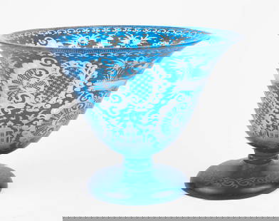 Blue Glass Acid Etched Footed Bowl Vase- Steuben ?: This ornate footed centerbowl or vase is covered with countryside images of animals and estates. It has some scratches, and could use a light cleaning, but looks to be in overall good condition. The d