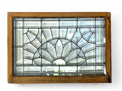 Framed Leaded Glass Window w/ Flower Motif.: This window has bevelled glass panels and a central flower design. Overall, it looks to be in good condition. The sight dimensions are 24" x 37 1/2". The frame dimensions are 29" x 42" x 2 1/8". Third
