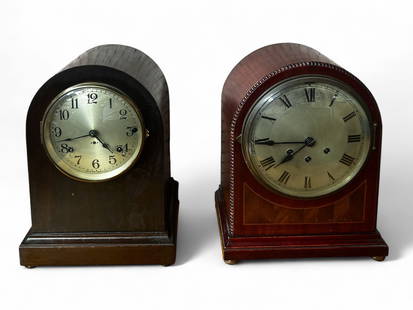 Pair of Keywind Chiming Clocks - Thomas & Becker.: The lot contains 2 vintage key wind mantel clocks. The darker piece is by Seth Thomas, and the other piece with inlaid wood and pearl molding details is by Gustav Becker. The items are untested, and a