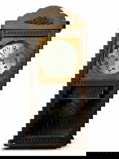 Carved Leaded Glass Wall Clock.: The clock features a leaded stained and clear glass window, pearl molding, and a carved floral decoration at the top. It measures 29" x 13 1/4" x 6 1/2". It does not come with key, and it is untested.