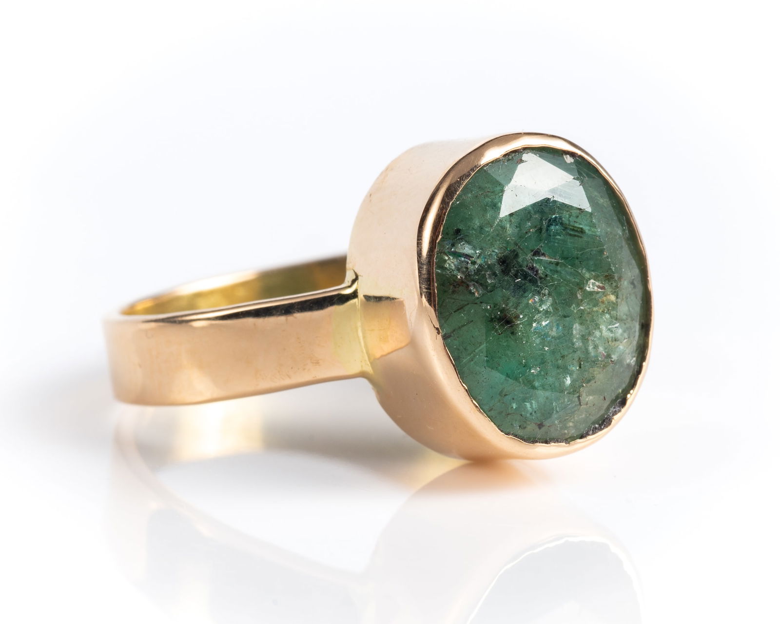 22K Gold & Lg. Natural Emerald Ring, Unisex.: The ring is unmarked but tested appropriately for 22K gold. It features an oval cut natural emerald which comes with a certificate from Earth Gems Testing Lab. The certificate states that it weighs 6.