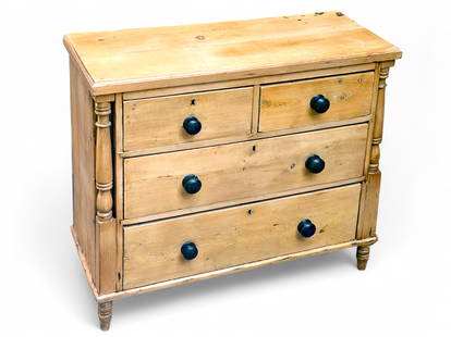 Pine Chest of Drawers.: The chest has four drawers with large dark wood knobs. There are some scratches and cracks in the wood, as well as a broken piece along the front column. Overall, though, it is in good condition. It m