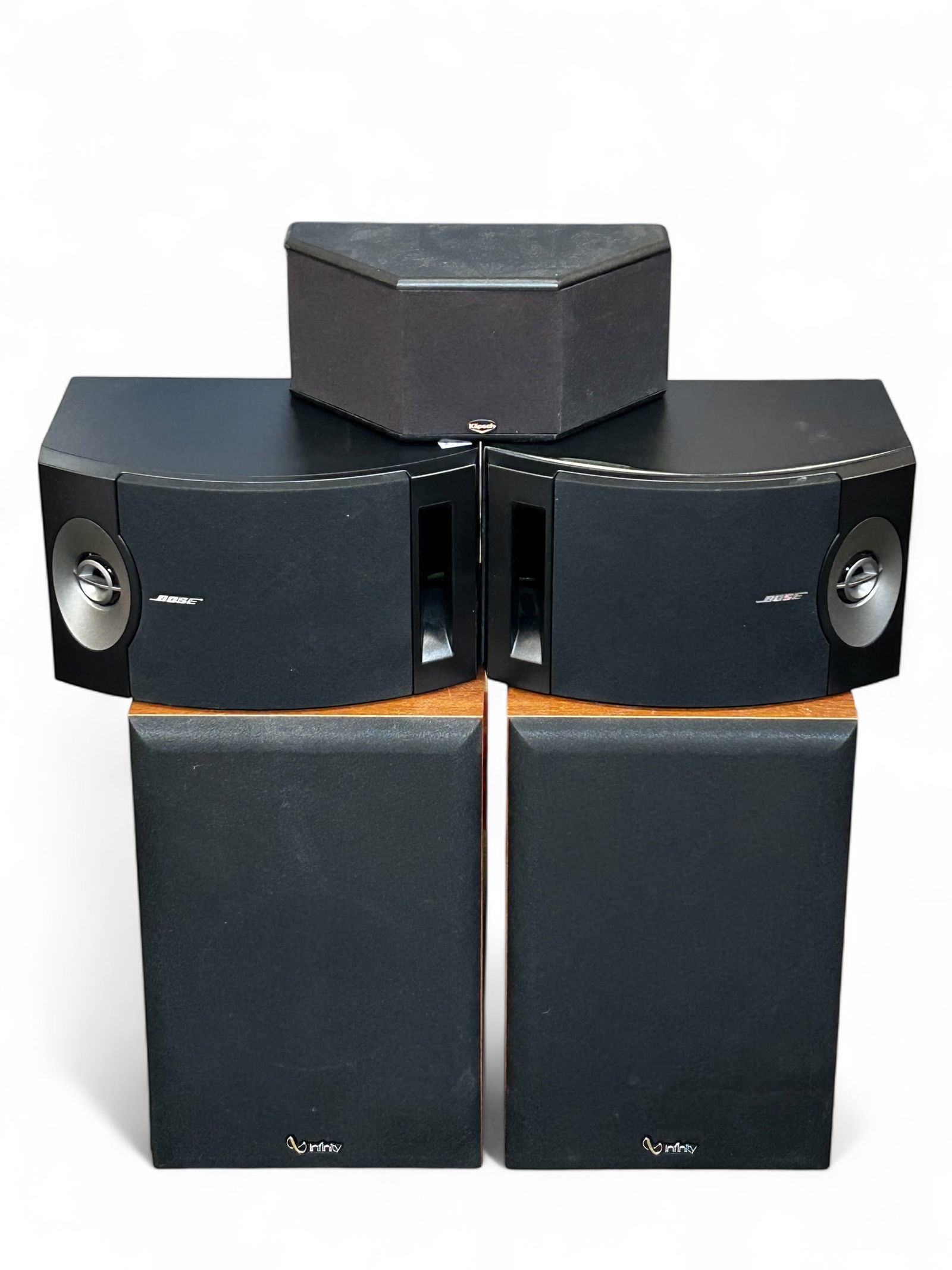 Lot of 5 Speakers - Infinity, Bose, Klipsch.: The lot contains 2 pair of speakers and a single speaker. There is a pair of Infinity SM 82 stereo speakers, and a pair of Bose 201 V speakers. Finally, there is a single Klipsch SS5 surround sound sp