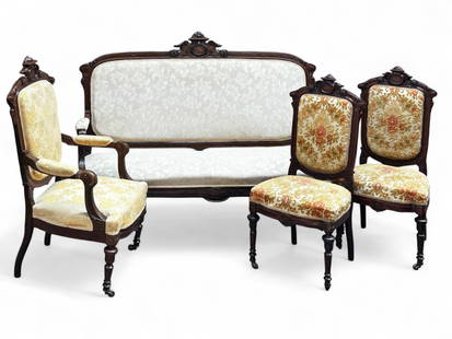 Rosewood Victorian Parlor Set, Herter Brothers ?: The 4 piece carved rosewood parlor set is possibly Herter Brothers. The lot contains a sofa, an armchair, and 2 side chairs with the same carvings, but distinct upholstery. The wooden frames feature a