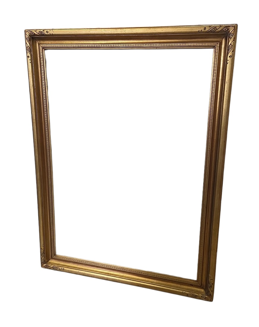Newcomb Macklin Style Carved and Gilded Mirror.: This frame is in the style of Newcomb Macklin, and looks to be in overall good condition. The frame opening measures 26" x 36", and the overall frame measures 31 1/4" x 41 1/2". In-house shipping is a