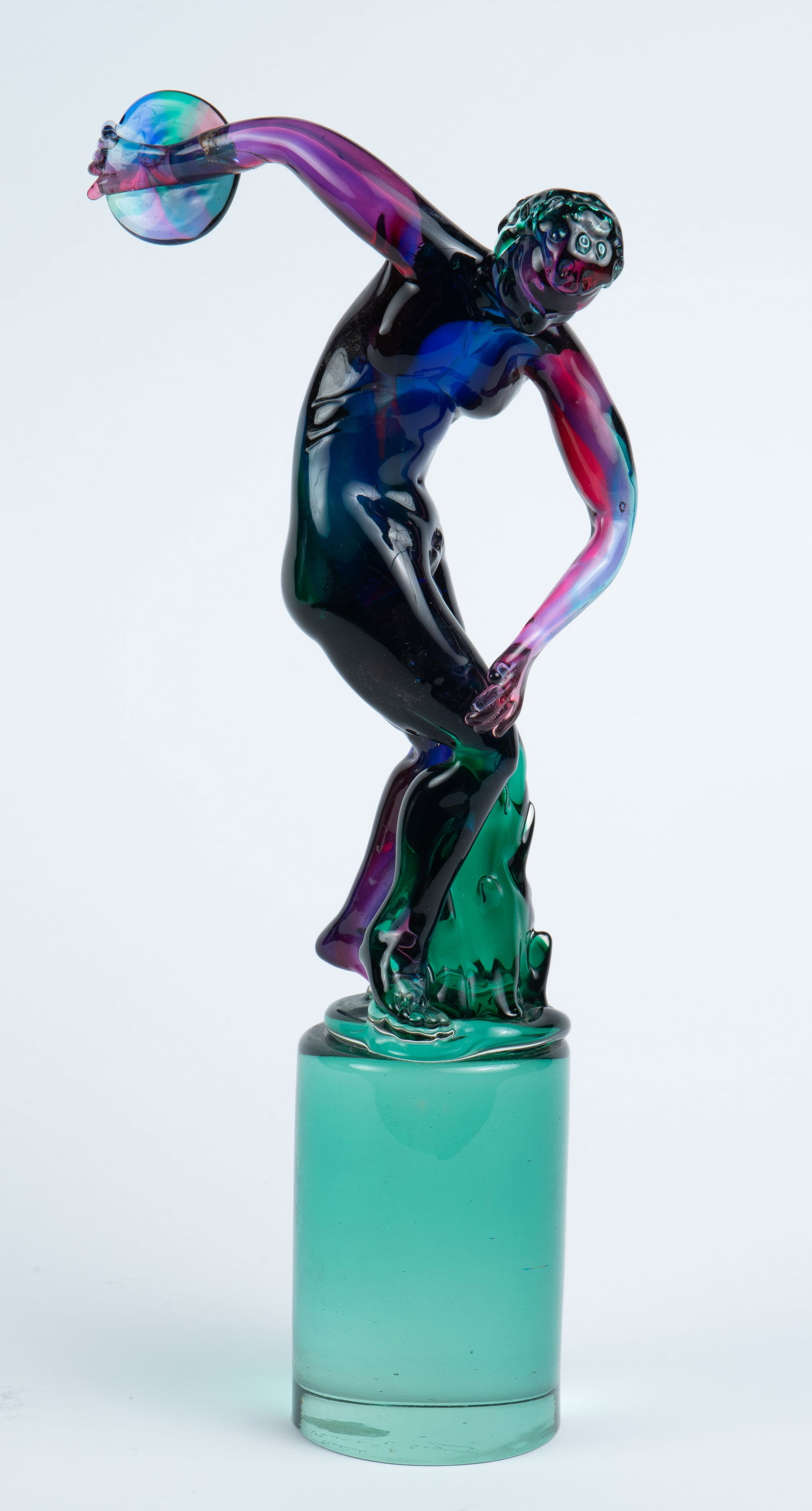 Art Glass Discus Thrower, Signed, "L. Seguso".: The underside is signed, "Salviati Venezia L. Seguso", and there is a worn manufacturer's sticker (probably Murano) present. The athlete's right arm has been repaired, and there are some scratches. It