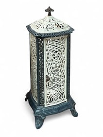 Antique Cast Iron Enamel Cylindrical Stove.