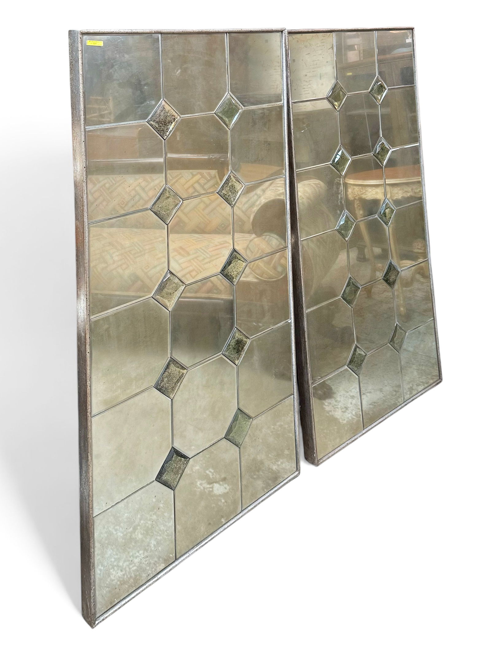 Pair of Uttermost Decorative Wall Mirrors.: Both are marked on the back, "Uttermost - Made in China." These decorative wall pieces could use a cleaning, and some of the mirror pieces show desilvering, but overall, they are in solid shape. Each