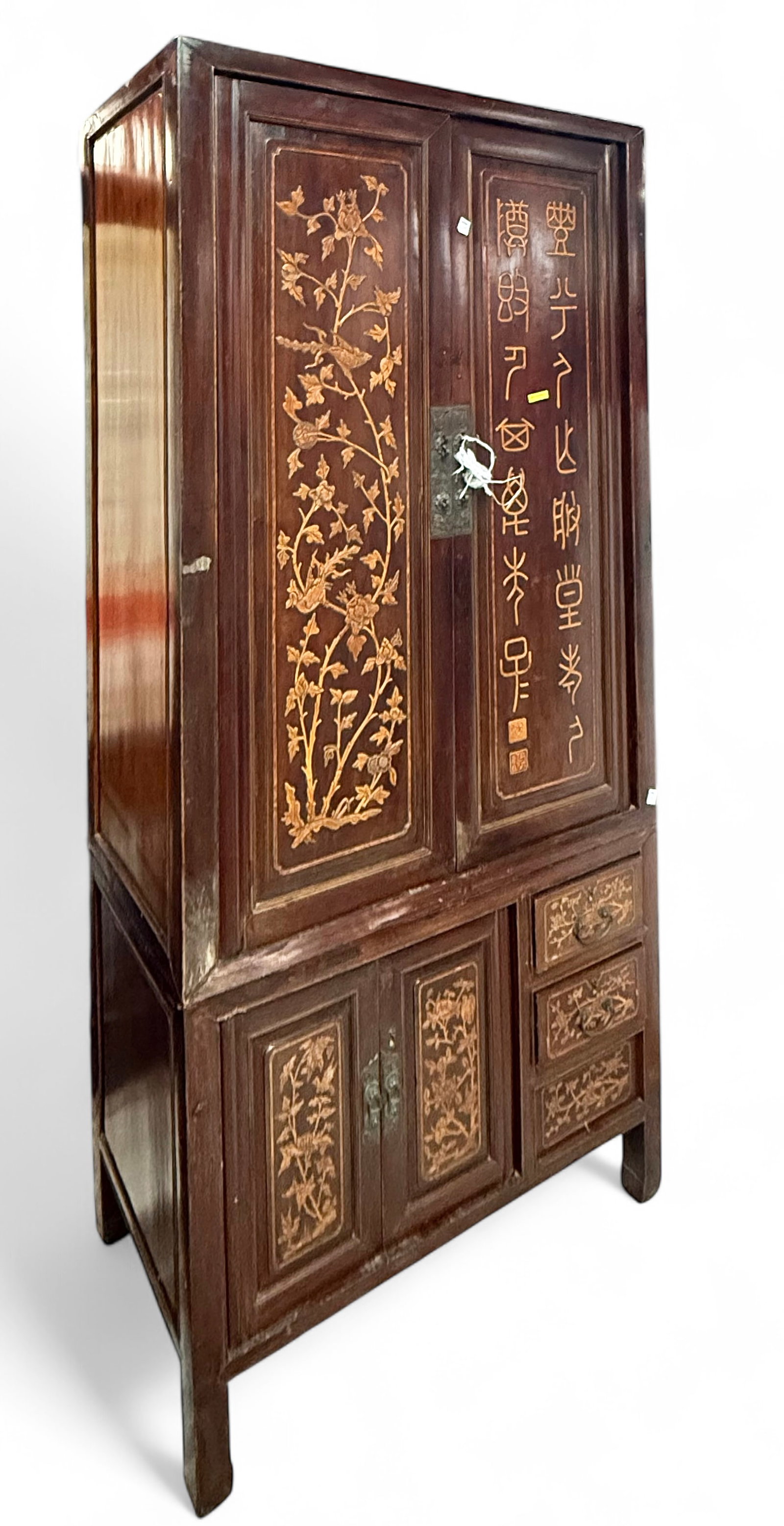 Large Asian Style Cabinet.: This dark wood (mahogany?) cabinet or armoire is decorated with flowers and birds. It has two main doors, inside of which is a storage space with a fixed shelf, and two more doors hiding another stora