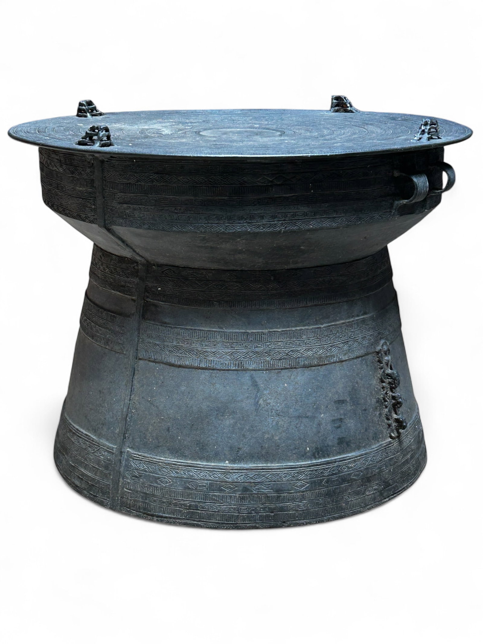 Cast Metal Asian Rain Drum.: There are some marks here and there, but overall, the drum is in good condition. It measures 18 1/2" tall, with a 24 1/2" diameter top. Third-party freight shipping or personal pickup is required. Ple